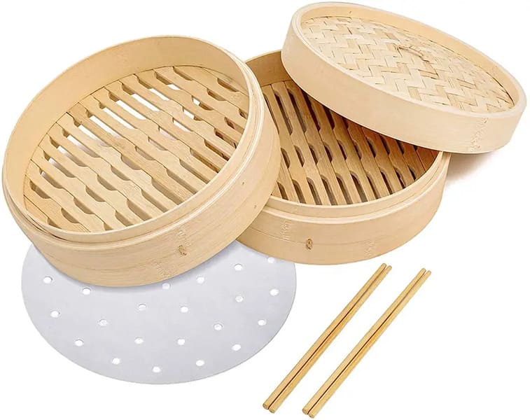 bamboo steamer with chopsticks